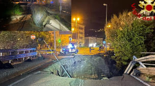 Maltempo, padre e figlio dispersi: si apre voragine in strada e precipitano con l'auto nel torrente